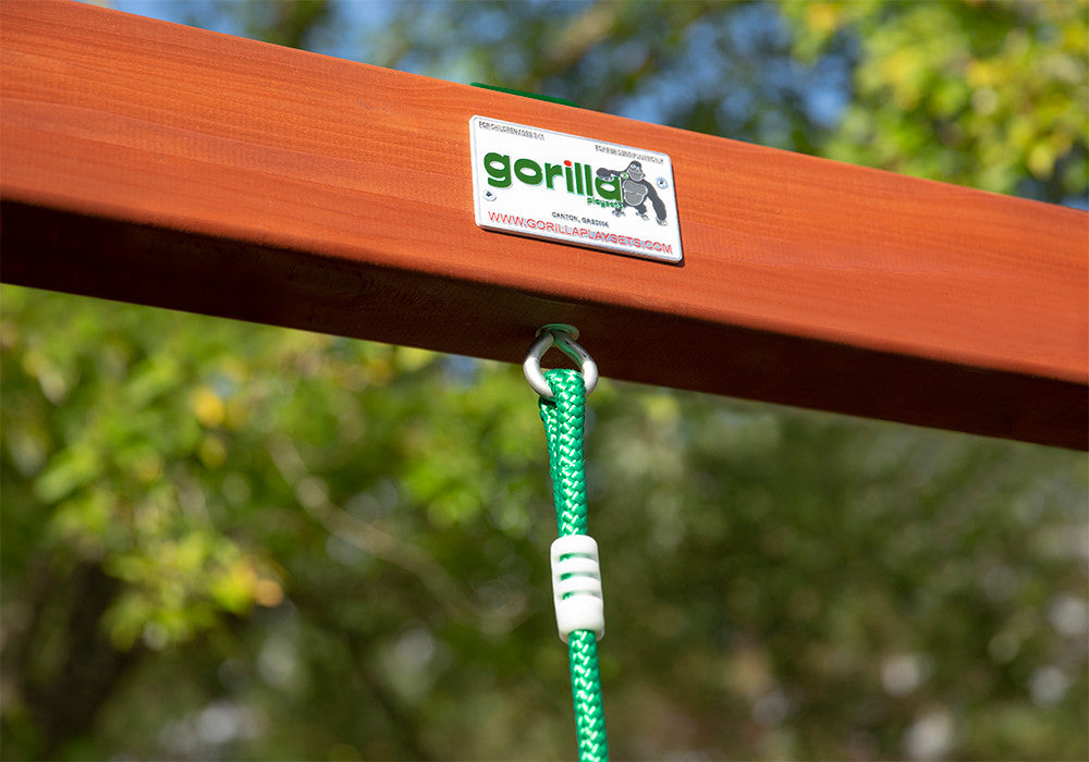 Lifestyle shot of the Green Disc Swing's Bolt Connection from Gorilla Playsets. Lifestyle shot of the Green Disc Swing's Bolt Connection from Gorilla Playsets.
