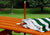 Close-up image of umbrella pole connection for children's picnic table by Gorilla Playsets.